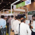Eco-friendly exhibition setup in India featuring sustainable materials, green booths, and waste management practices